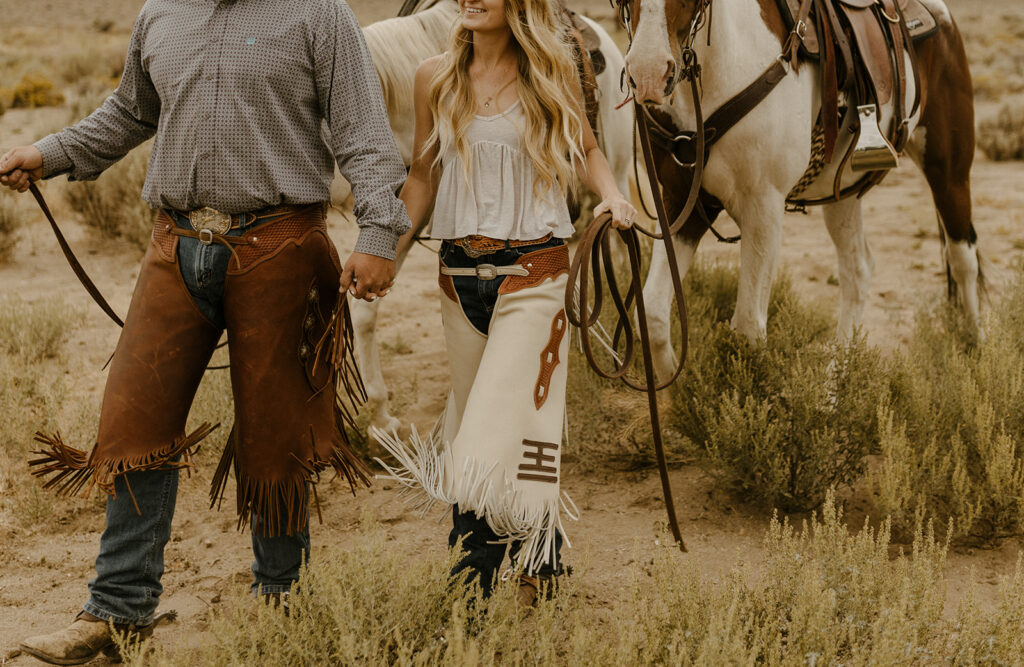tyler and sarah elrod with horses in western attire