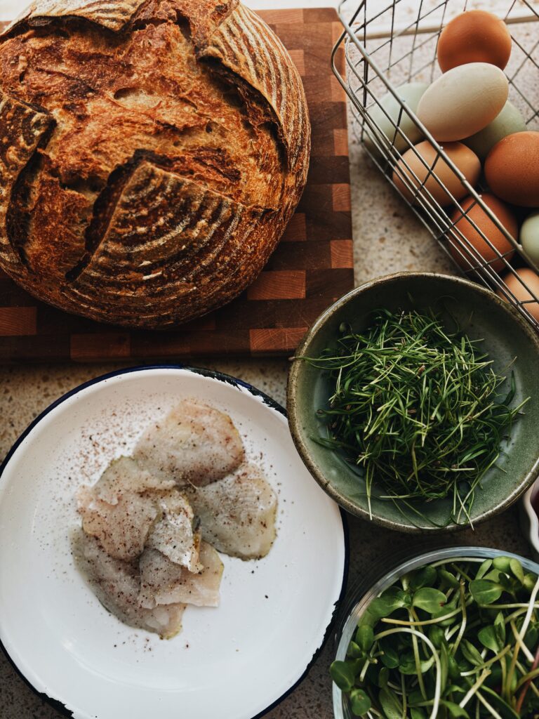 flat lay of food and bread on a table