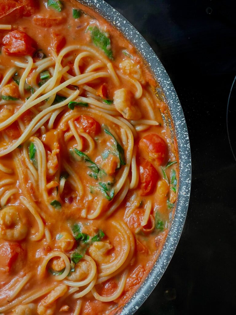 close up of a red sauce pasta dish