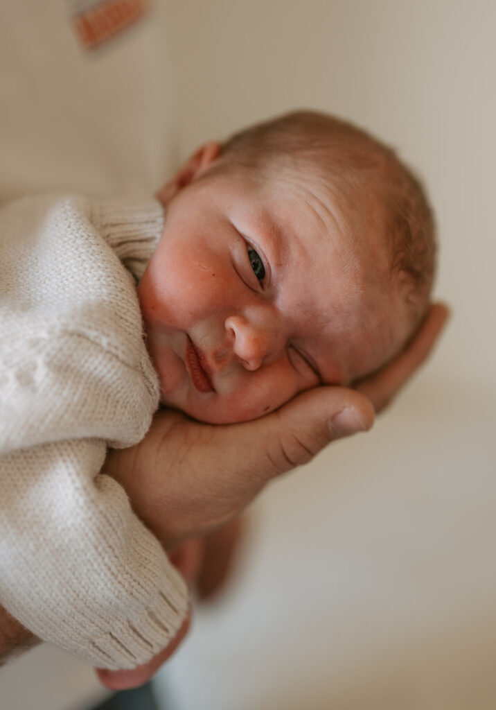 neutral newborn photo at home