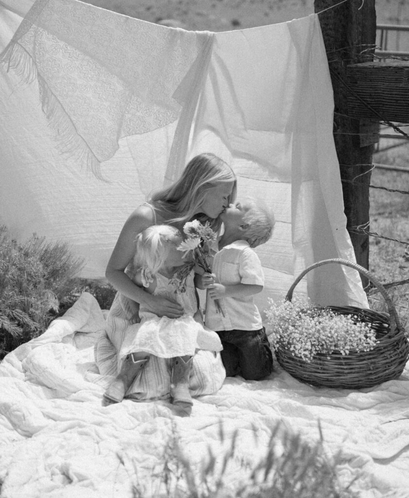 black and white image of mom and kids